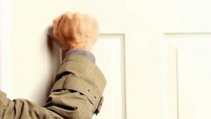 Man Knocking Door